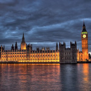 The Palace of Westminster by the Thames at night
				(Photo by Maurice)