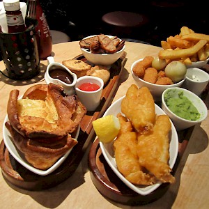 Fish and chips and meat pies are staples of British pub menus (Photo cormac70)